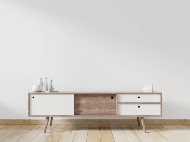 istock TV cabinet mockup in empty room with wooden floor. 1175615114