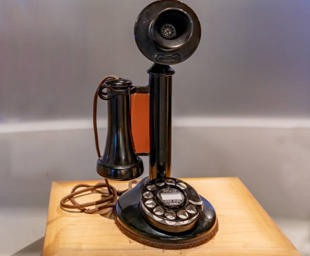 retro-kerze telefon - wireless telegraphy stock-fotos und bilder