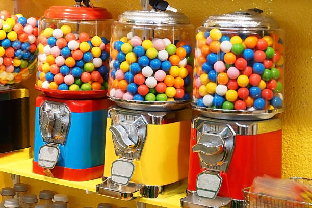 fancy colourful candy coin vending machine stock photo