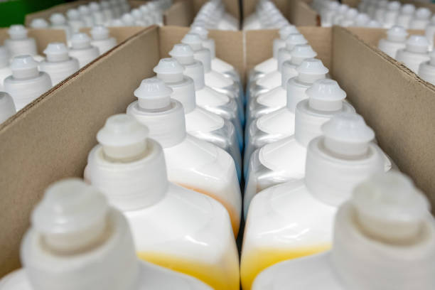 istock Rows of white plastic dishwasher liquid bottles in diminishing perspective 1175621537