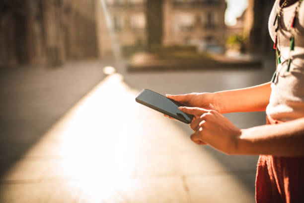 istock Close up of a woman using mobile phone 1175622519