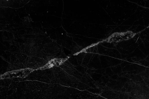 istock Black marble background with scratches and dirt 1175630815