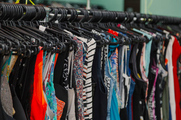 istock Colorful clothes on hangers in a store 1175639365
