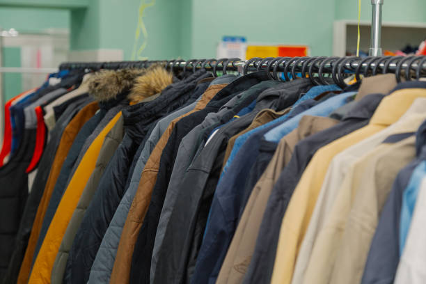 istock Colorful clothes on hangers in a store 1175639402