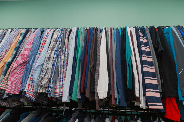 istock Colorful clothes on hangers in a store 1175639443