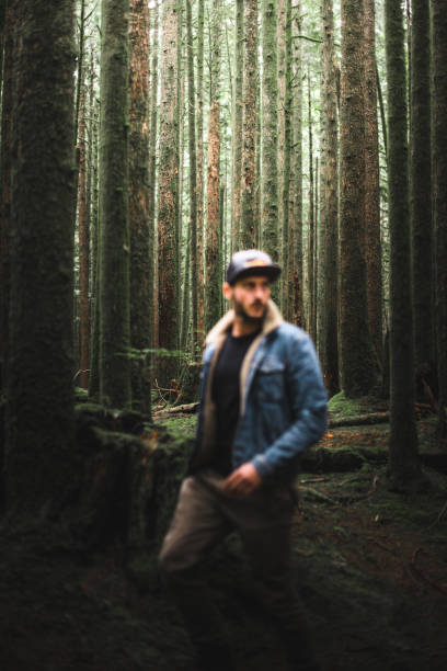 istock man portrait in the forest 1175644083
