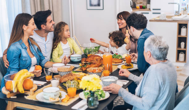 istock Family eating Christmas lunch 1175645003
