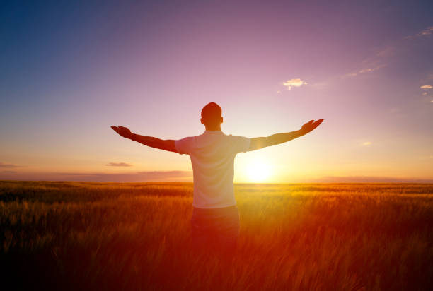 istock Man feeling free in a beautiful natural setting. 1175647533