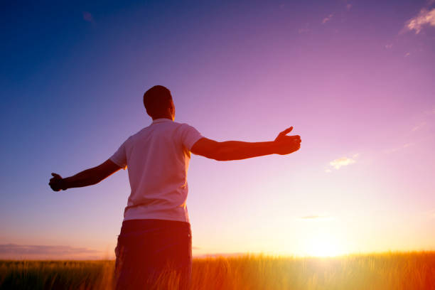 istock Man feeling free in a beautiful natural setting. 1175647552