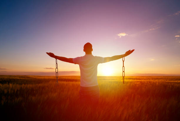 istock Man feeling free in a beautiful natural setting. 1175647574