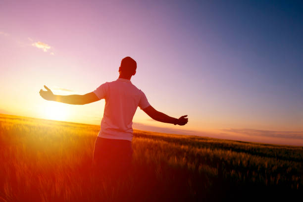 istock Man feeling free in a beautiful natural setting. 1175647590