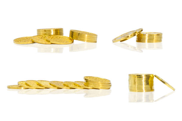 istock 4 pile of gold coins isolated on white background. 1175649439