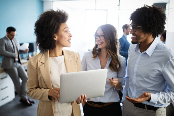 istock Successful group of business people at work in office 1175649619