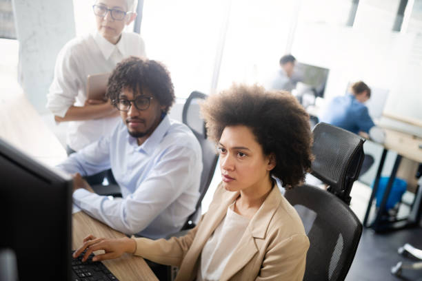 istock Successful business group of people at work in office 1175650405