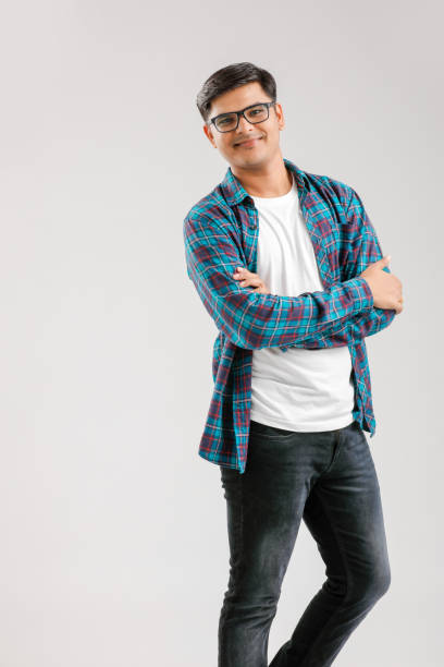 istock Happy young Indian man over white background 1175650806