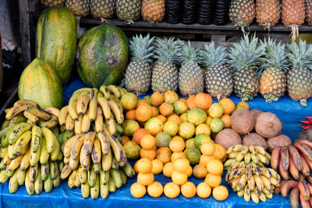 Sunlight casts a golden glow on a fruit stand on the island of Kauai, Hawaii.