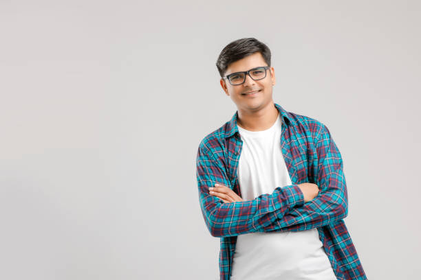 istock Happy young Indian man over white background 1175651603