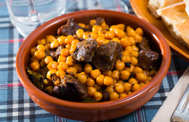 istock Stewed beef with chickpea in clay bowl 1175652176