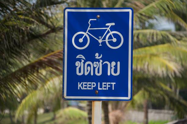istock Keep Left, traffic signs in Thailand 1175653803