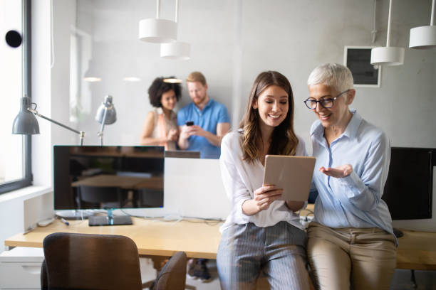 istock Group of successful business people at work in office 1175658230