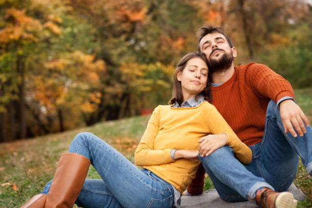 istock Young couple enjoying in silence in nature 1175660484