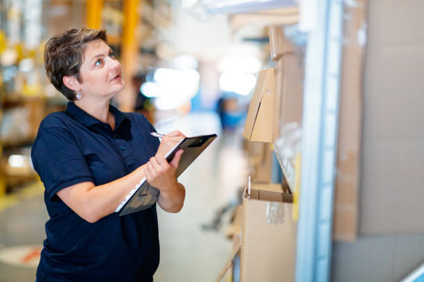 istock Woman holding checklist and looking up 1175660493