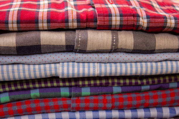istock Ironed shirts stacked over each other 1175662939