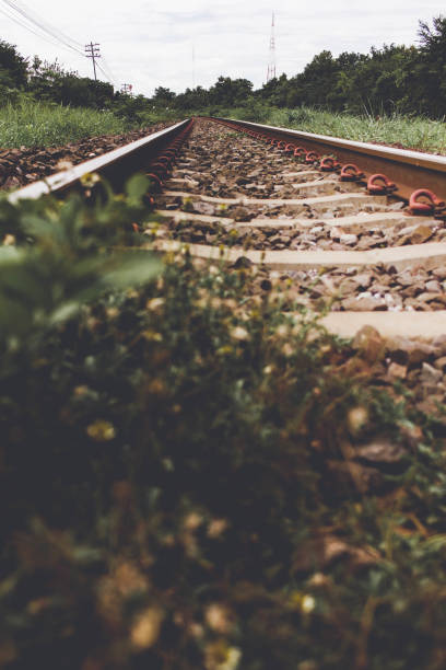 istock Retro Railroad tracks background vintage 1175664920