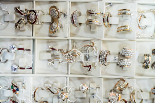 istock Selective focus on golden jewellery on showcase 1175673127