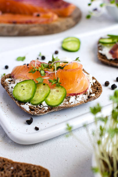 istock Rye bread, smoked salmon, cucumber and microgreens 1175676115
