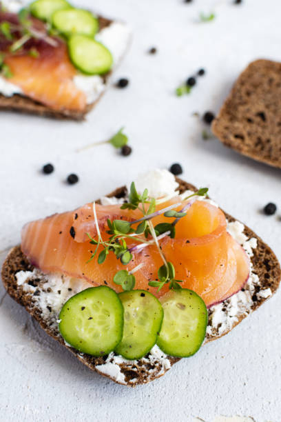 istock Rye bread, smoked salmon, cucumber and microgreens 1175676487