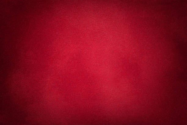 sfondo opaco rosso scuro in tessuto scamosciato, primo piano. - felt foto e immagini stock