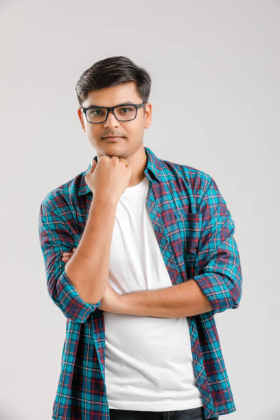 istock Happy young Indian man over white background 1175676986