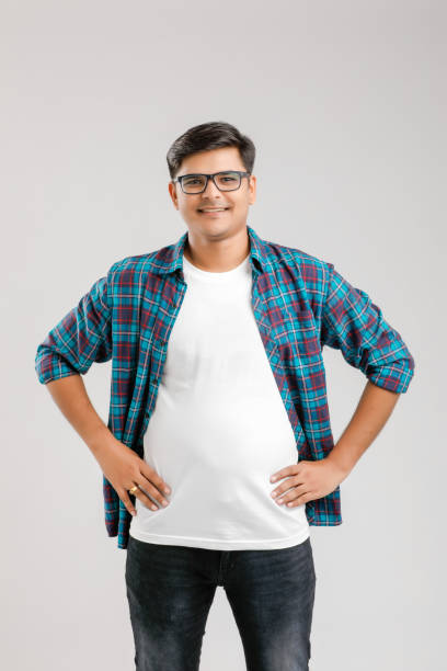istock Happy young Indian man over white background 1175677061