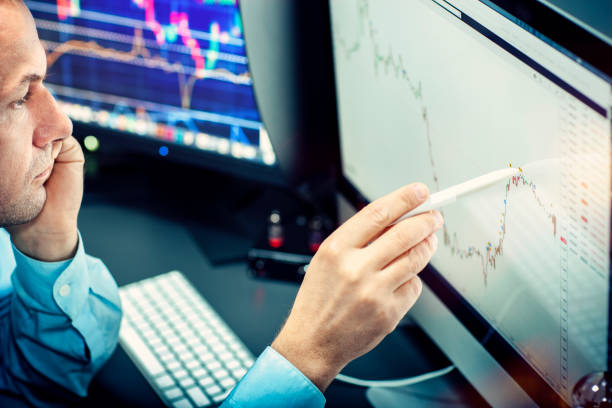 istock Stockbroker analyzes the financial chart. 1175677194