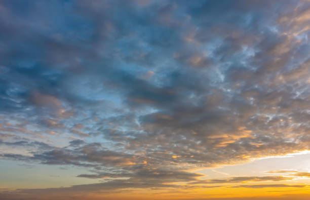 istock Sunset sky. Abstract nature background. Dramatic blue and orange, colorful clouds at twilight time. 1175684738
