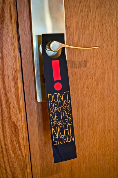 istock Do not disturb sign on a door 1175685121
