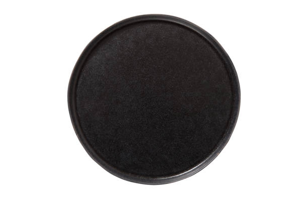 istock Black plate isolated on white background. Top view mock up. 1175687572