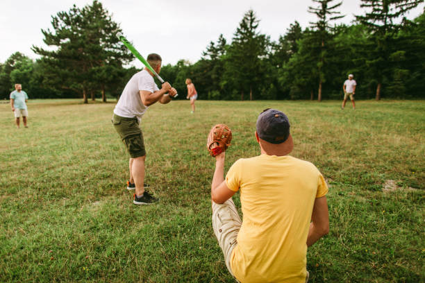 istock Enjoying game of baseball with friends 1175690627