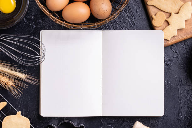 istock Making cookies cookbook recipe design concept, baking ingredients preparation layout with notebook. 1175691128