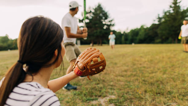 istock Enjoying game of baseball with friends 1175691274