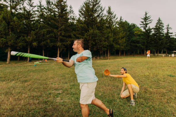 istock Enjoying game of baseball with friends 1175691275