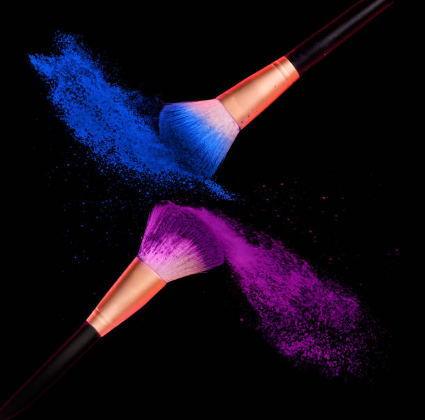 cosmetics brush and explosion colorful makeup powder on black - face powder exploding make up dust imagens e fotografias de stock