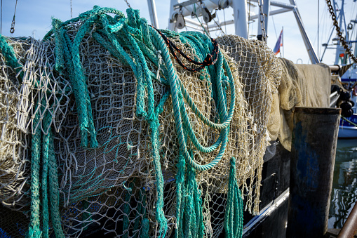 nets and ropes, equipment on a fishing boat in the harbor,