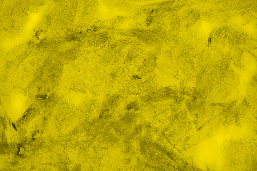 Yellow texture of decorative plastered wall. Textured background. Great for design and texture background.
