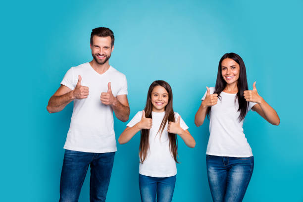 photo of three family members raising thumbs up advising new product wear casual outfit isolated blue background - child women outdoors mother imagens e fotografias de stock