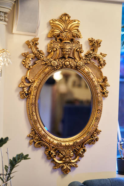 istock Old carved round mirror with gilding 1175700775