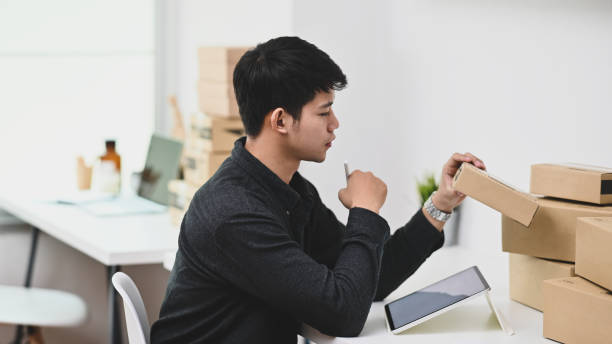 istock Online business owner checklist a box with tablet computer. 1175701055