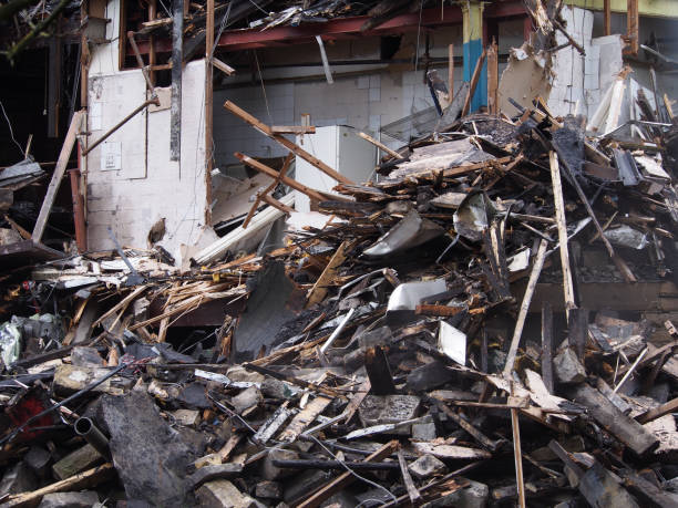 istock black burned timbers and walls in a collapsed house destroyed by fire 1175701967