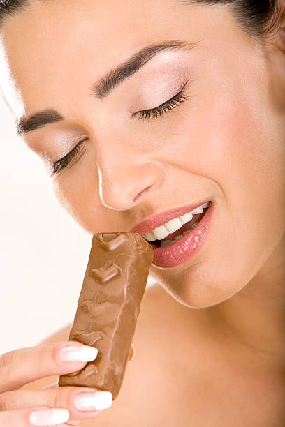 istock Woman eating  chocolate 117570583